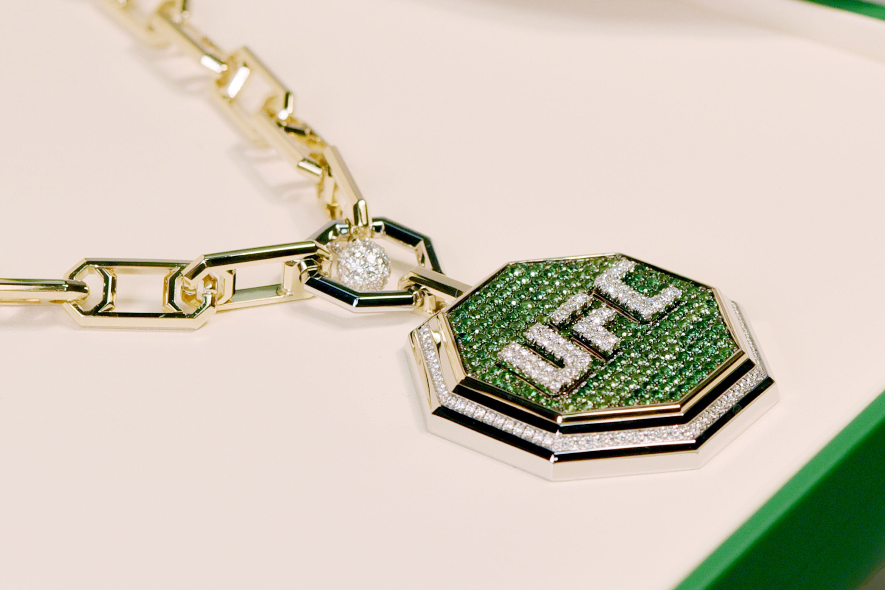 Undisputed Luxury – See The UFC Pendant Featuring Over 380 Rare Gemstones