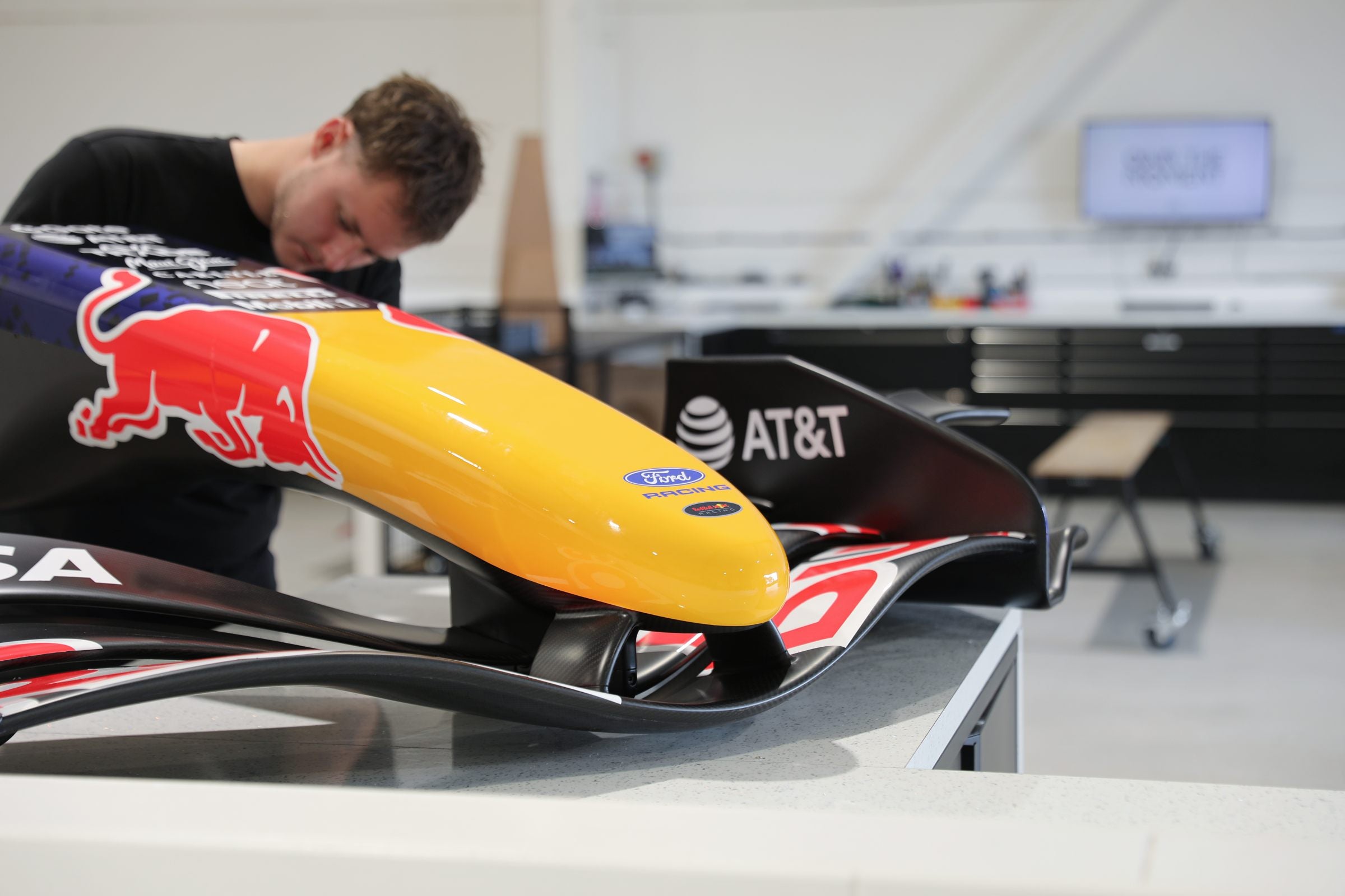 Technician working on a Red Bull Racing nose cone